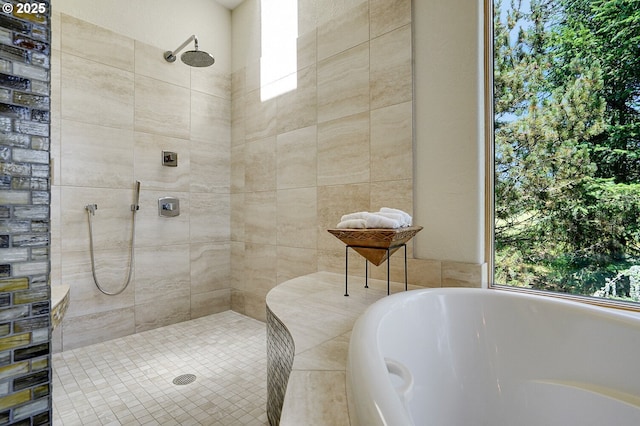 full bath with a tile shower and a tub to relax in