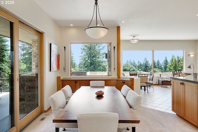 dining room with visible vents, recessed lighting, and a healthy amount of sunlight