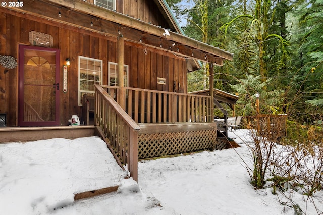 view of snow covered deck