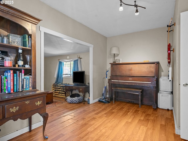 sitting room with wood finished floors