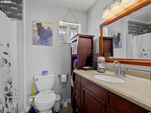 bathroom with tile patterned floors, vanity, a shower with curtain, baseboards, and toilet