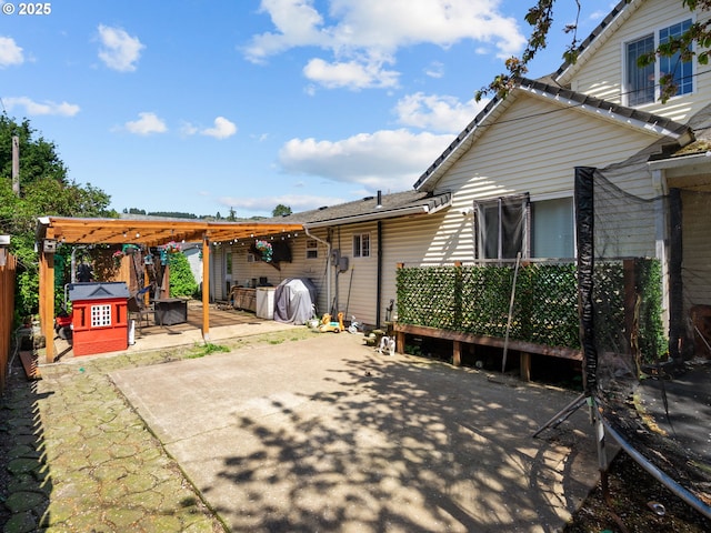 view of patio / terrace with fence