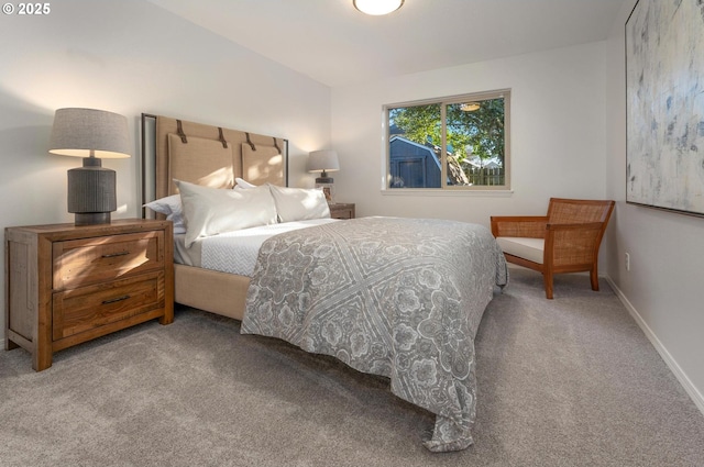 carpeted bedroom with baseboards