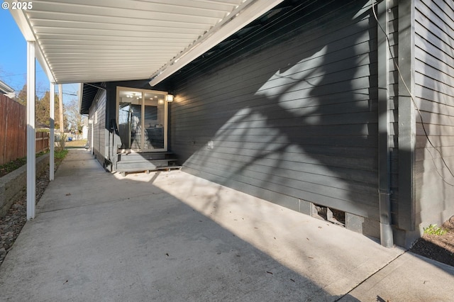 view of patio / terrace featuring fence