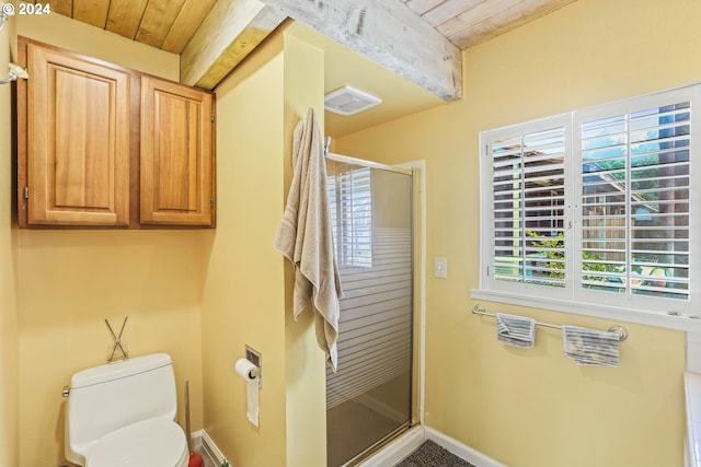 bathroom with a shower with door, beamed ceiling, wood ceiling, and toilet