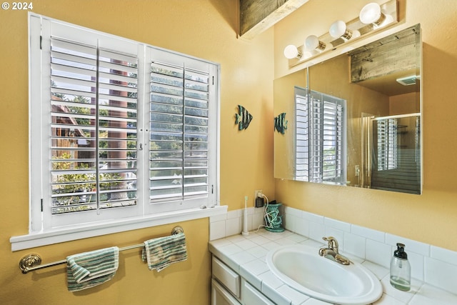 bathroom featuring vanity and walk in shower