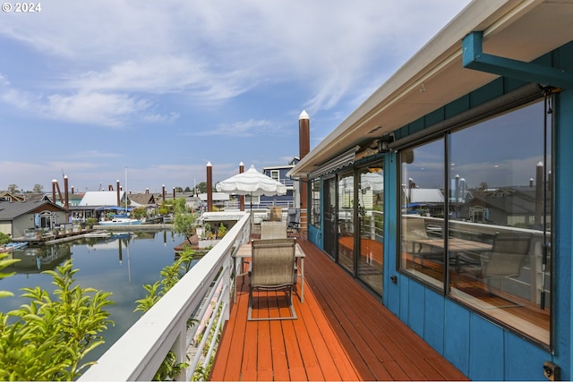 deck featuring a water view