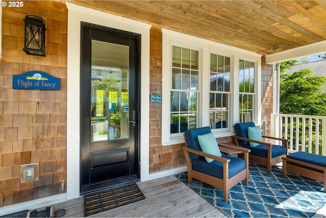 entrance to property with a porch