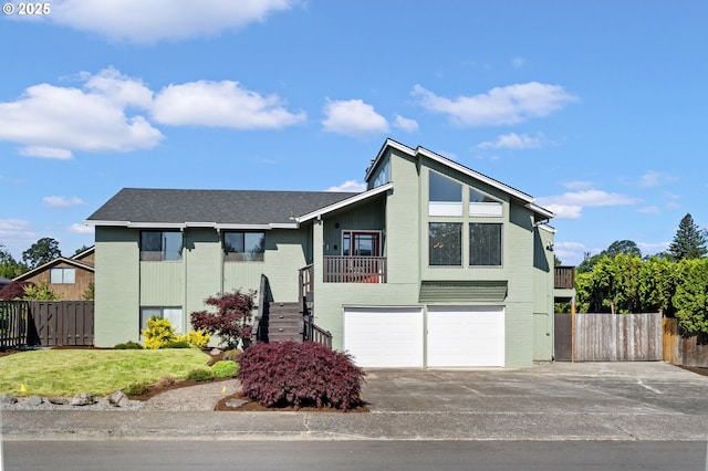 461 NE 16th Ave, Hillsboro, OR 97124 - view of front of property with a garage, concrete driveway, stairs, and a shingled roof