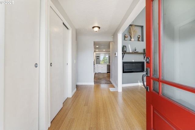 461 NE 16th Ave, Hillsboro, OR 97124 - foyer with light wood-style floors and baseboards