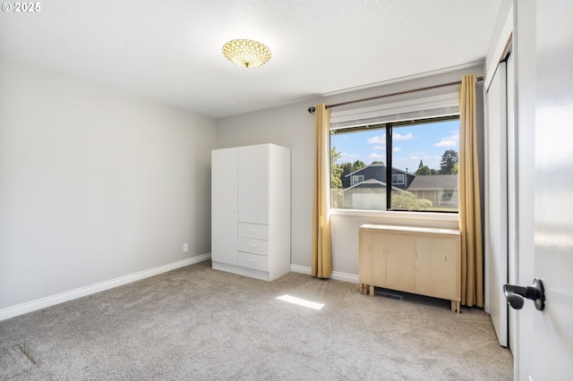 461 NE 16th Ave, Hillsboro, OR 97124 - unfurnished bedroom featuring carpet and baseboards