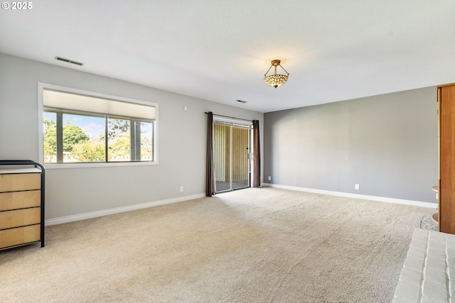 461 NE 16th Ave, Hillsboro, OR 97124 - empty room featuring light carpet and baseboards