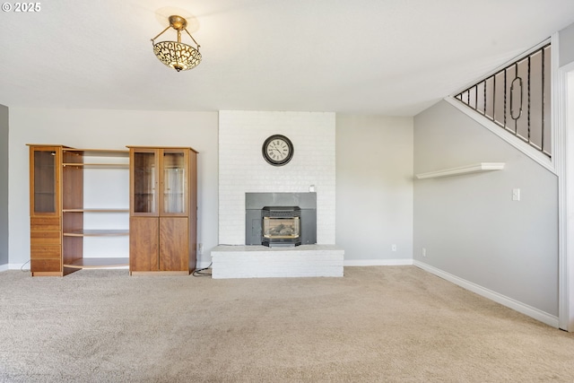 461 NE 16th Ave, Hillsboro, OR 97124 - unfurnished living room featuring carpet flooring and baseboards