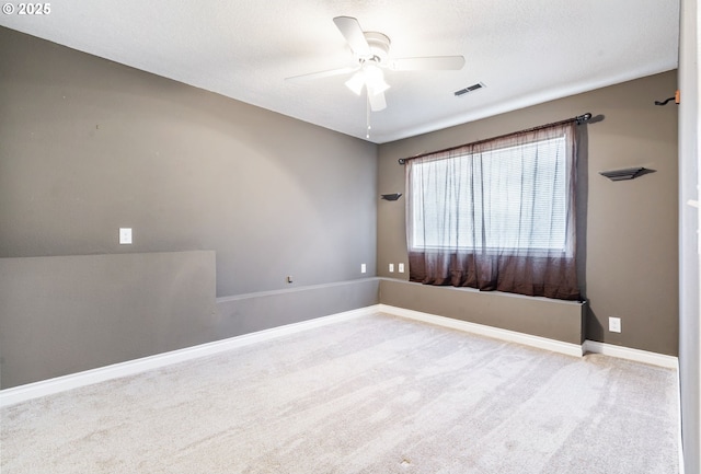 461 NE 16th Ave, Hillsboro, OR 97124 - spare room featuring a ceiling fan, carpet floors, and baseboards