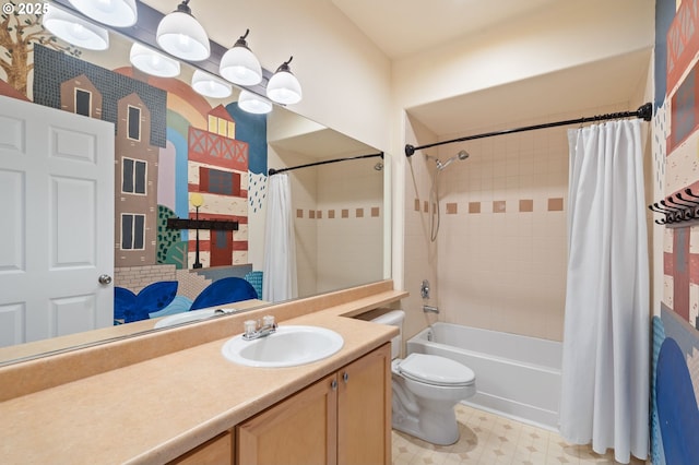 bathroom with vanity, tile patterned floors, shower / bath combo, and toilet