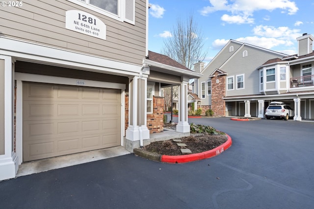 garage featuring driveway