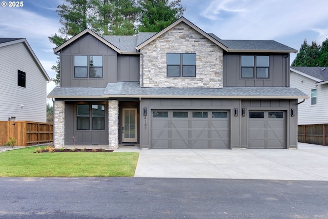 view of front facade with driveway, board and batten siding, an attached garage, and fence