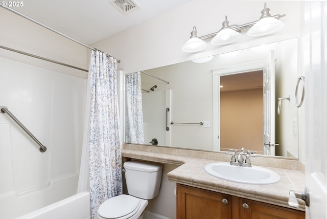 full bathroom featuring toilet, vanity, and shower / bathtub combination with curtain