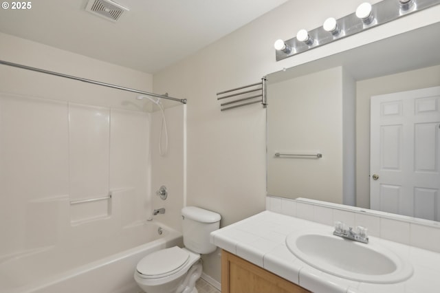 full bathroom with vanity, tub / shower combination, and toilet