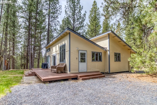 16811 Covina Rd, Bend, OR 97707 - back of property featuring a wooden deck