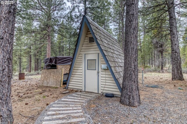 16811 Covina Rd, Bend, OR 97707 - view of shed with a wooded view