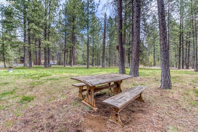 16811 Covina Rd, Bend, OR 97707 - view of home's community with a yard and a wooded view