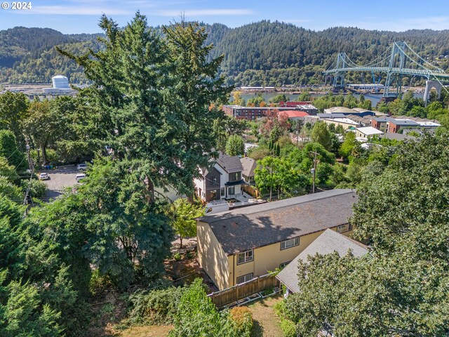 birds eye view of property featuring a mountain view