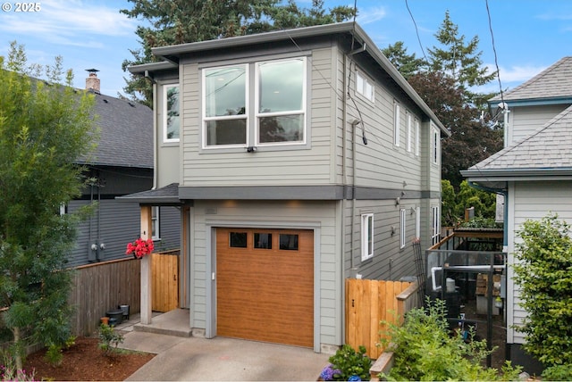 1011 NE 73rd Ave, Portland, OR 97213 - view of front of property featuring a garage and concrete driveway
