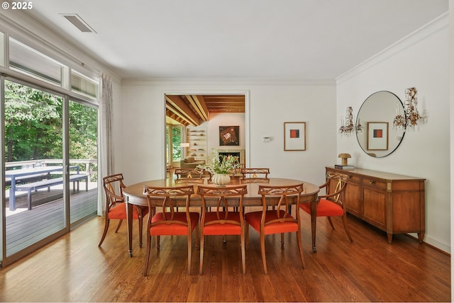 6151 SW Mill St, Portland, OR 97221 - dining space with wood finished floors and crown molding