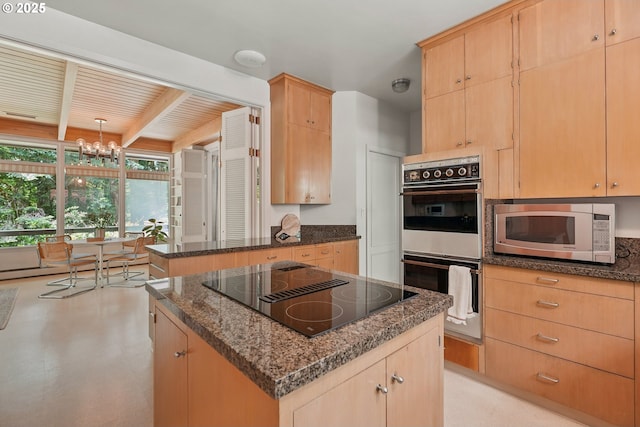6151 SW Mill St, Portland, OR 97221 - kitchen featuring black appliances, light brown cabinets, dark stone counters, and beam ceiling
