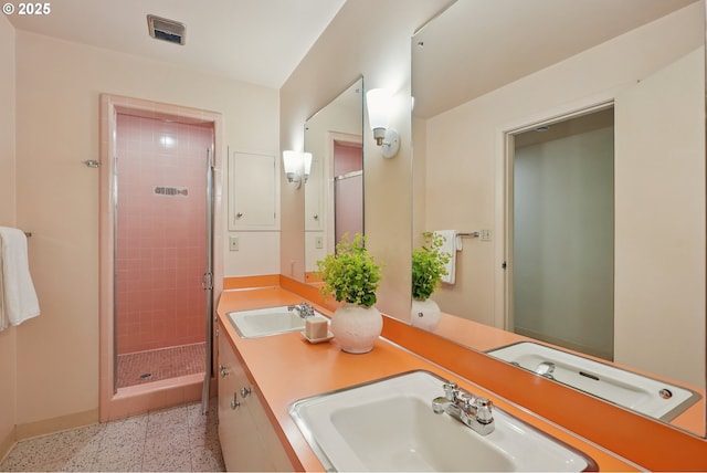 6151 SW Mill St, Portland, OR 97221 - bathroom featuring a stall shower and double vanity