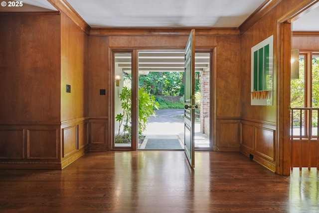 6151 SW Mill St, Portland, OR 97221 - entryway with a decorative wall, ornamental molding, dark wood-style flooring, wood walls, and french doors