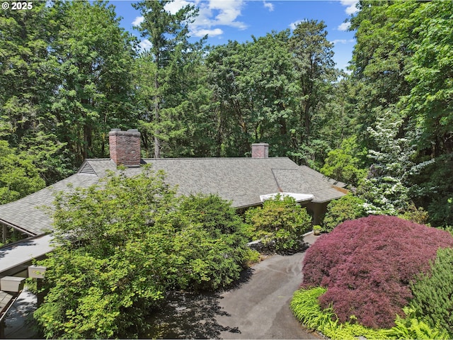 6151 SW Mill St, Portland, OR 97221 - exterior view of a heavily wooded area