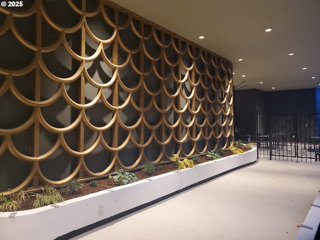 interior space featuring concrete flooring and recessed lighting