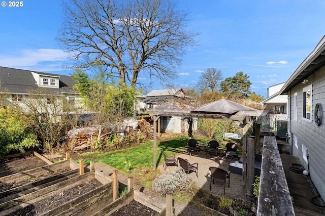 155 S 8th St, Saint Helens, OR 97051 - view of yard featuring fence and a vegetable garden