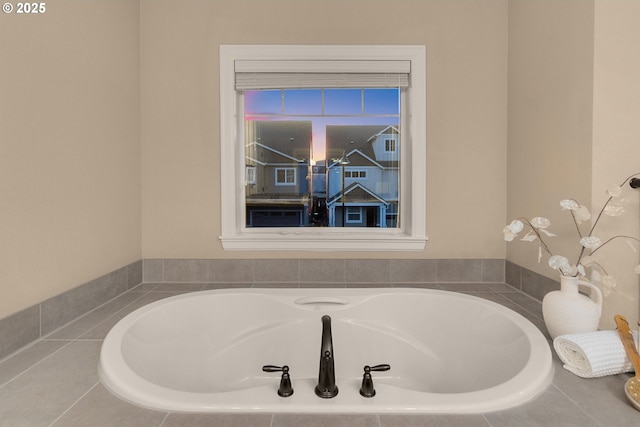 bathroom with tiled tub