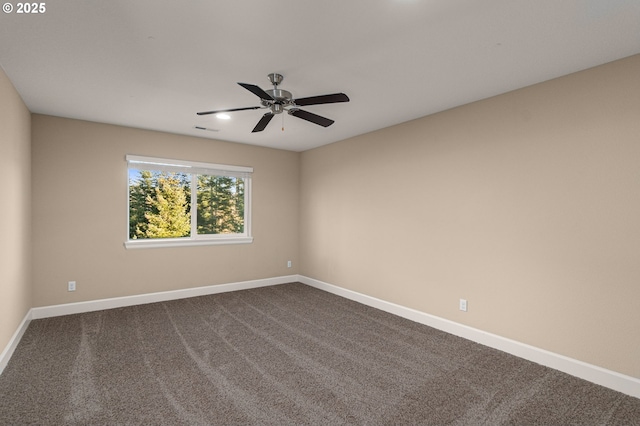 carpeted empty room with ceiling fan