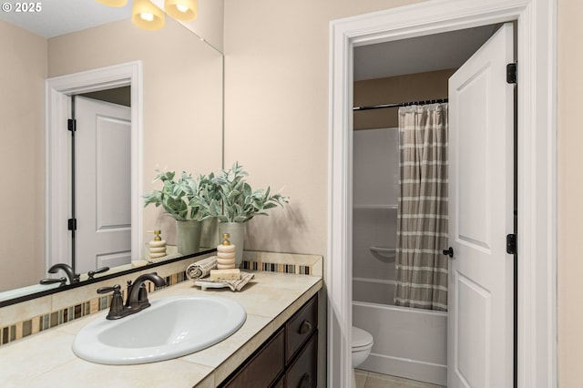 full bathroom with vanity, toilet, tile patterned flooring, and shower / bath combo with shower curtain