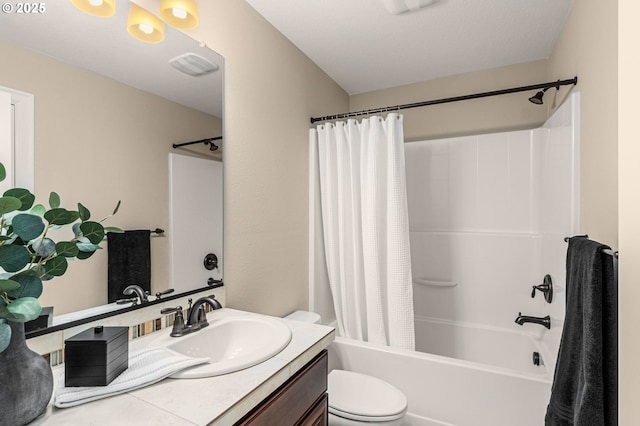 full bathroom with vanity, shower / bath combination with curtain, and toilet