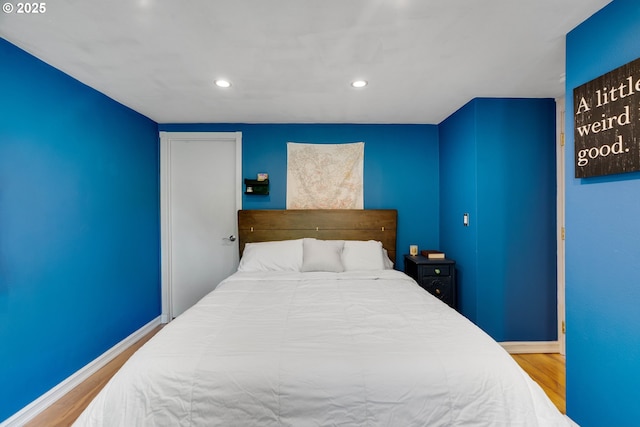 7508 SW Barnes Rd Unit A, Portland, OR 97225 - bedroom featuring wood finished floors and recessed lighting
