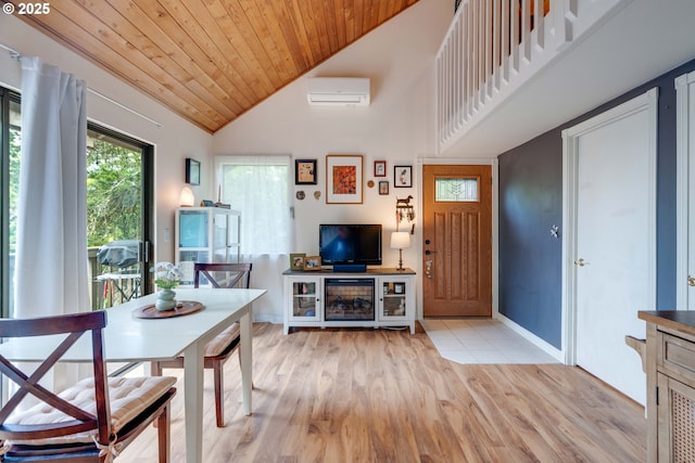 7508 SW Barnes Rd Unit A, Portland, OR 97225 - dining room with a wall unit AC, light wood-style floors, high vaulted ceiling, and wood ceiling