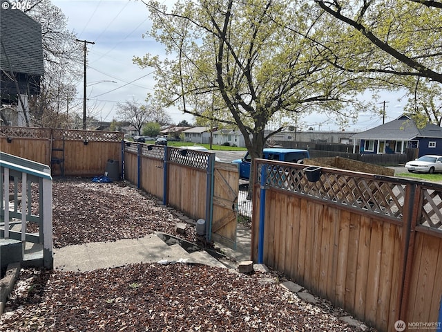 808 N 9th Ave, Walla Walla, WA 99362 - view of yard with fence private yard, a residential view, and a gate
