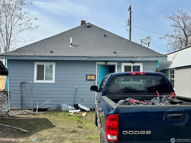 808 N 9th Ave, Walla Walla, WA 99362 - back of property with roof with shingles and a chimney