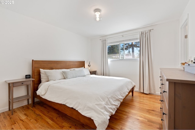 65 SW Frenwood Way, Beaverton, OR 97005 - bedroom with light wood-style floors and baseboards