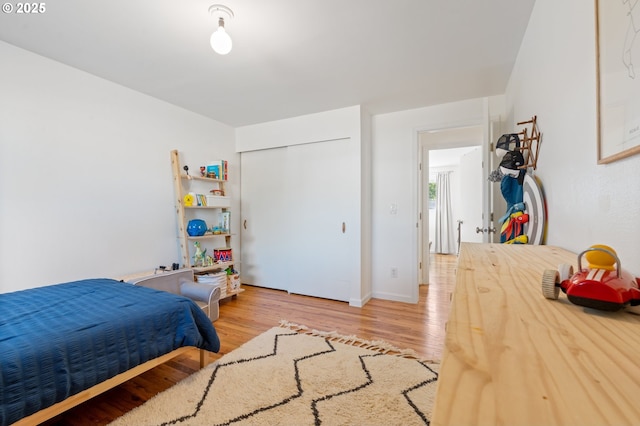 65 SW Frenwood Way, Beaverton, OR 97005 - bedroom featuring wood finished floors and a closet