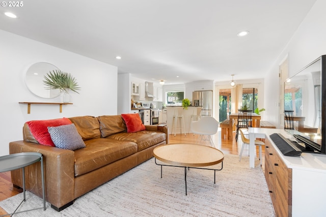 65 SW Frenwood Way, Beaverton, OR 97005 - living room featuring light wood-style floors and recessed lighting