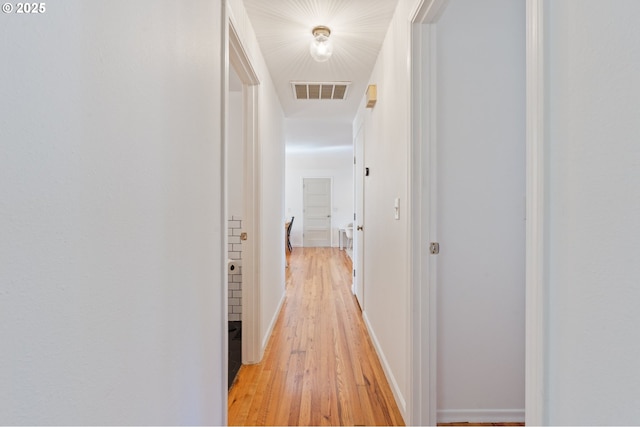 65 SW Frenwood Way, Beaverton, OR 97005 - hallway featuring light wood-style floors and baseboards