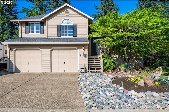 808 SE Beaver Creek Ln, Troutdale, OR 97060 - view of front of home featuring an attached garage, stairs, roof with shingles, and driveway