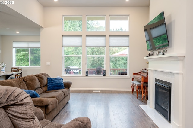 2314 SW 43rd St, Gresham, OR 97080 - living room featuring a fireplace with flush hearth, wood-type flooring, and recessed lighting