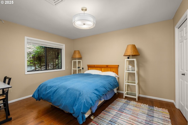 142 Lyons Rd, Stevenson, WA 98648 - bedroom with wood finished floors, baseboards, and a closet